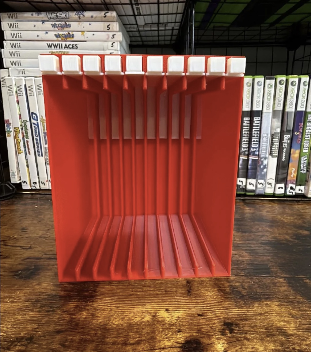 Front view of the empty red Switch rack with white push buttons