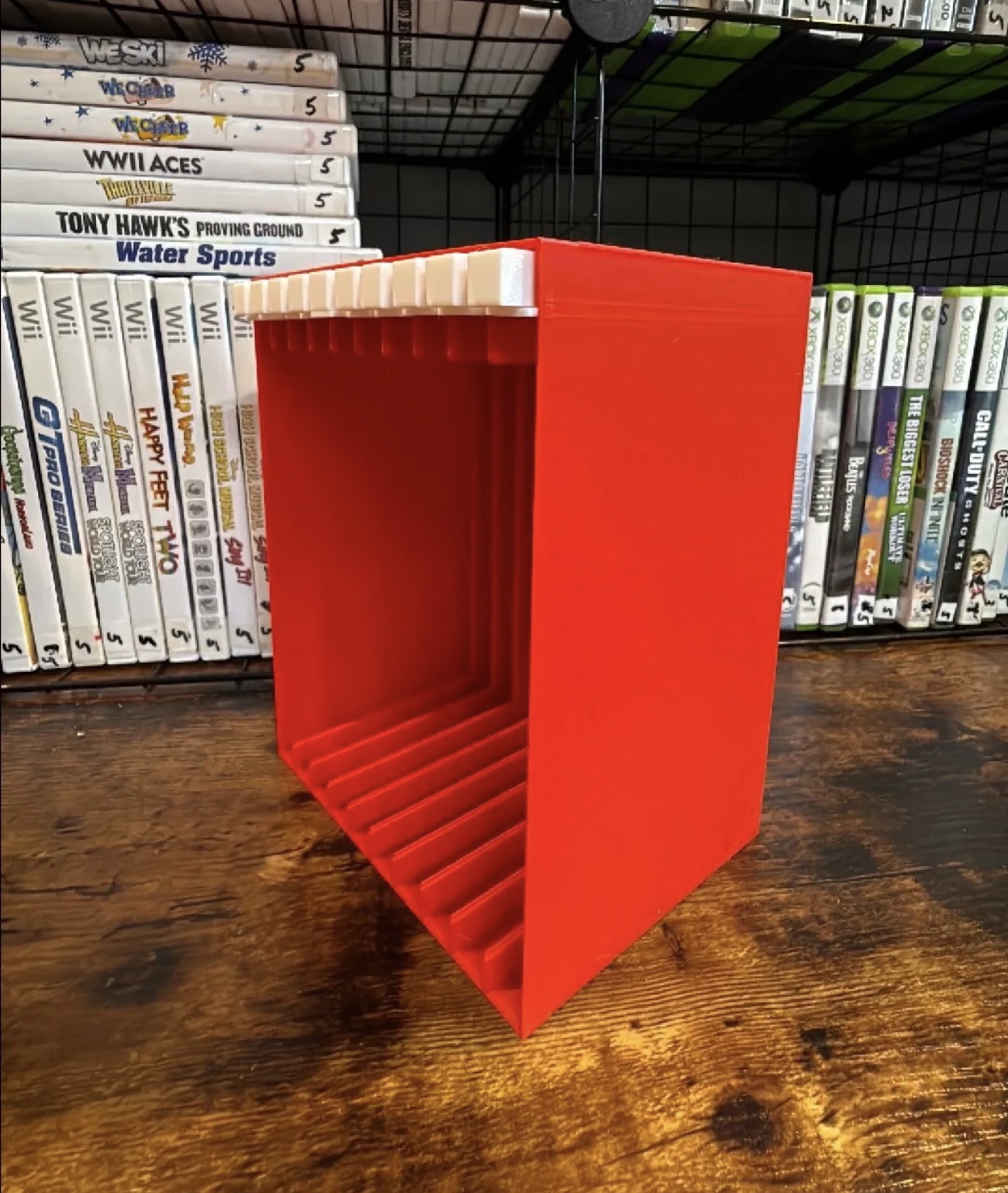 Side view of the red Nintendo Switch game case rack